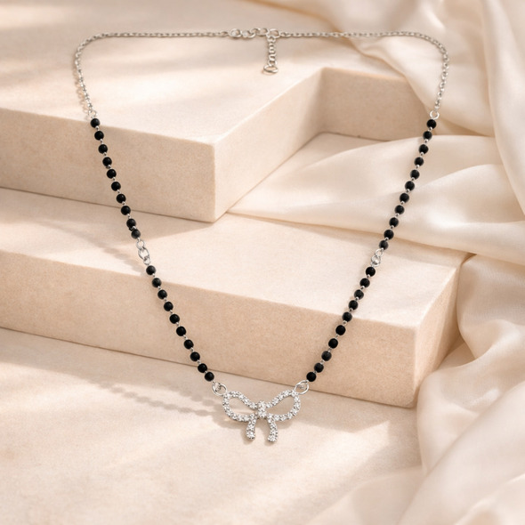 Glittering Bow Mangalsutra – 92.5 Sterling Silver Necklace with Sacred Black Beads and Pavé-Set Crystal Bow Pendant